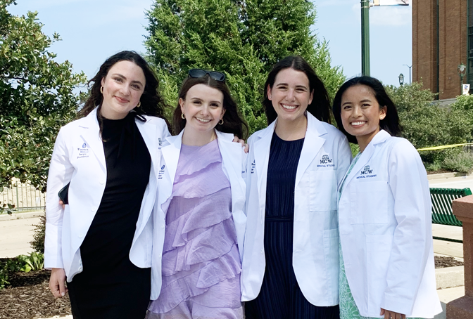 Group of MCW white coat med students