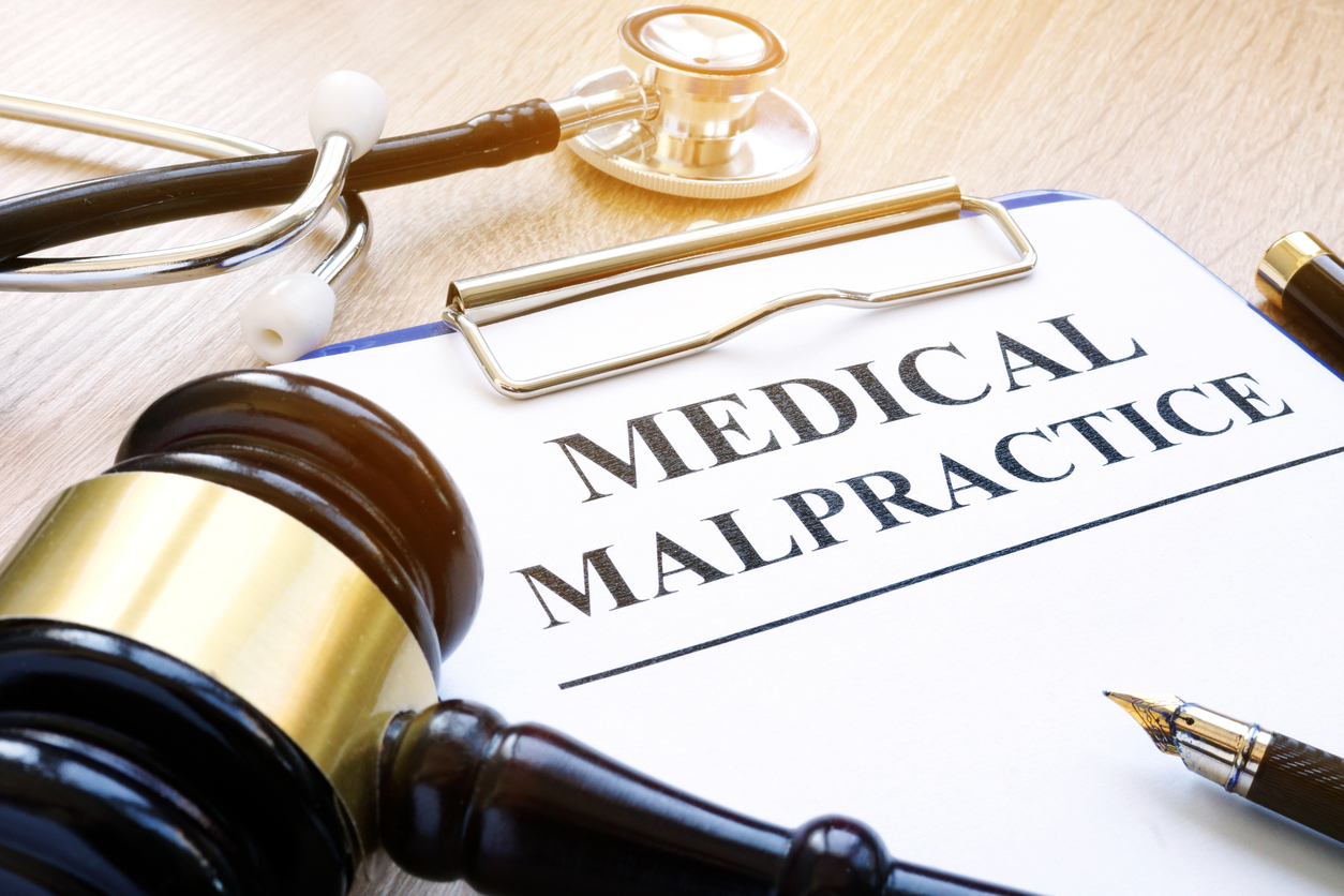 Med Mal paperwork with stethoscope